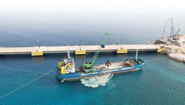 Clamshell Dredger located in the Caribbean